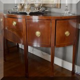 F21. Baker Furniture Historic Charleston mahogany demilune buffet. 37”hx 64”w x27”d 